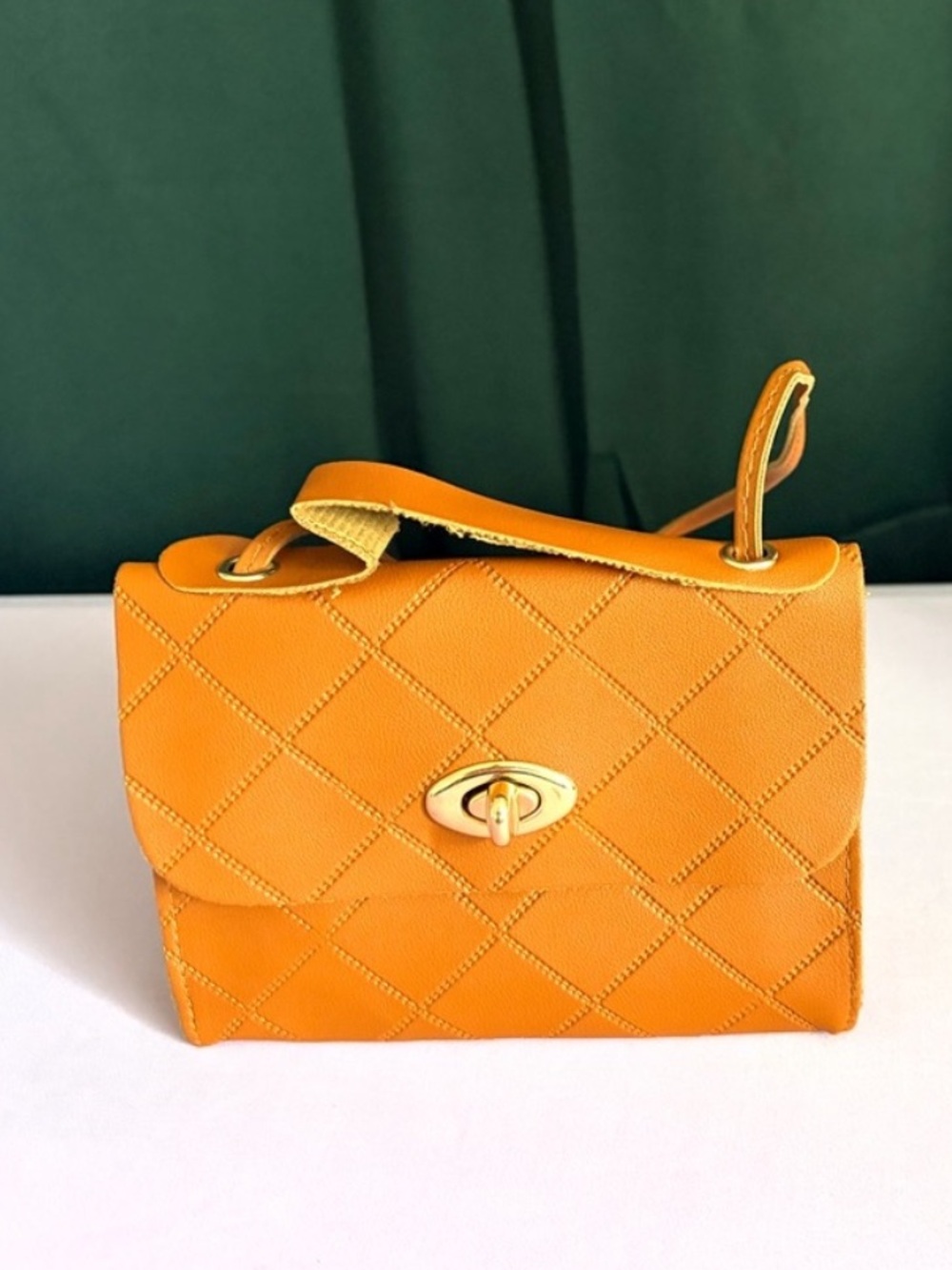 Women’s Small brown crossbody bag.